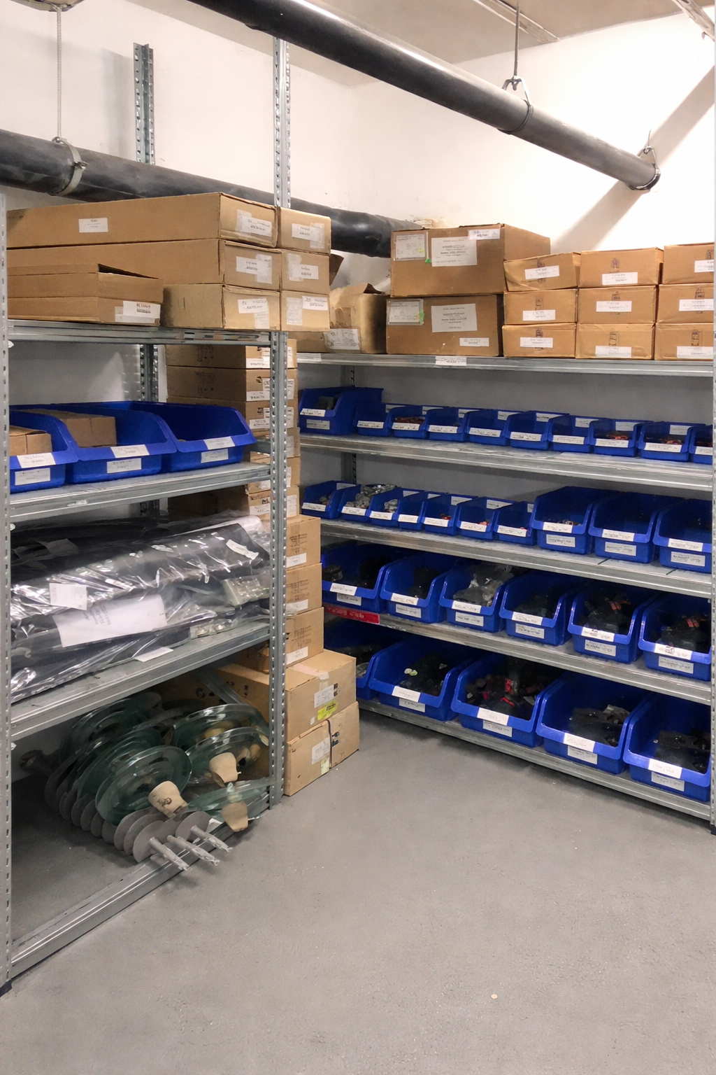 Warehouse Shelves with Blue Bins